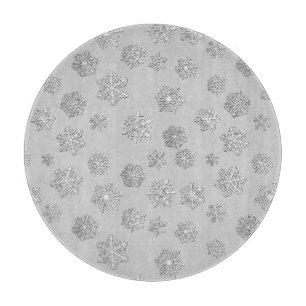 Silber 3-D Schneeflocken auf silberem Hintergrund Schneidebrett