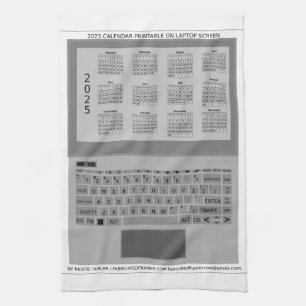 Silberne Laptop-Tastatur 2025 Kalender auf dem Bil Geschirrtuch