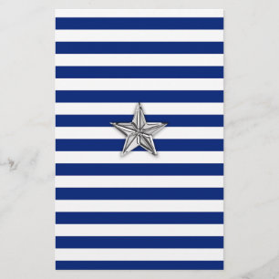 Silberner nautischstern auf blauen Streifen Briefpapier