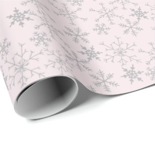 Silbernes Schneeflockenmuster auf rosa Weihnachten Geschenkpapier