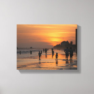 Silhouette am Strand Leinwanddruck