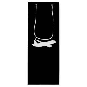 Silhouette der Flugzeugjet-Liner mit schwarzer Dec Geschenktüte Für Weinflaschen