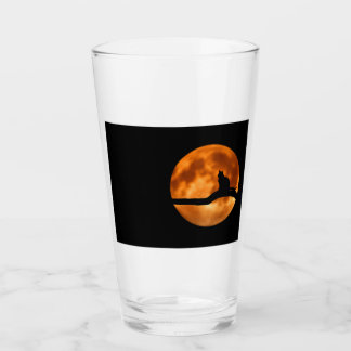 Silhouette einer schwarzen Katze in einem Baum Glas