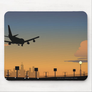 Silhouette eines Flugzeugs im Flug Mousepad