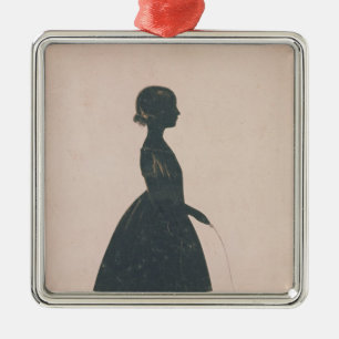 Silhouette eines Mädchens mit einem Silbernes Ornament