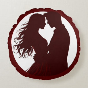 Silhouette eines Paares, das sich von Angesicht zu Rundes Kissen