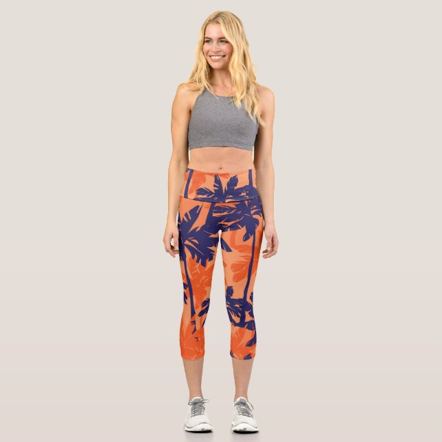 Silhouette mit blauer Palme, orangefarbener Hinter Capri Leggings (Vorderseite)