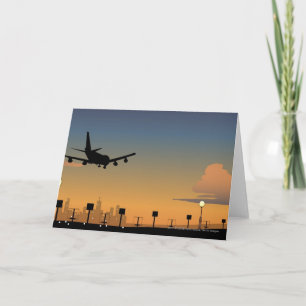 Silhouette of an airplane in flight karte