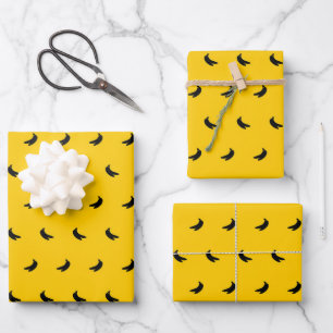 Silhouetten kleiner schwarzer Bananen auf Gelb Geschenkpapier Set