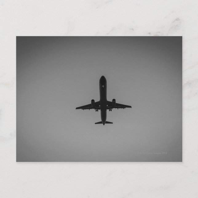 Silhouettierte Flugzeuglandung Postkarte (Vorderseite)