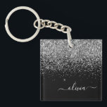 Silver Black Glitzer Script Monogram Girenname Schlüsselanhänger<br><div class="desc">Schwarze und Silberne Imitate Foil Sparkle Glitzer Script Monogram Name Schlüsselanhänger. Das macht den perfekten 16 Geburtstag,  Hochzeit,  Brautparty,  Jubiläum,  Babydusche oder Junggeselinnen-Abschied Geschenk für jemanden,  der Lieben glamourösen Luxus und schicke Stile.</div>