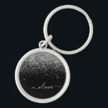 Silver Black Glitzer Script Monogram Girenname Schlüsselanhänger<br><div class="desc">Silver und Black Sparkle Glitzer Script Monogram Name Keychains (Key Chain). Das macht den perfekten 16 Geburtstag,  Hochzeit,  Brautparty,  Jubiläum,  Babydusche oder Junggeselinnen-Abschied Geschenk für jemanden,  der Lieben glamourösen Luxus und schicke Stile.</div>