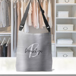 Silver Brushed Metal Schwarz-weiß Script Monogram Tragetaschen Mit Langen Trägern<br><div class="desc">Diese elegante personalisierte Crossbody-Tasche ist mit einem Monogramm und einem Vornamen in modernem Schwarz-Weiß-Drehbuch auf einem silbernen Imitat mit gebürstetem Metallhintergrund versehen.</div>