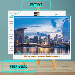 Singapur Flyer & Marina Bay Sands Modern Postkarte<br><div class="desc">Wenn Sie Ihre Erfahrungen austauschen möchten, ist es eine süße Geste, einer Freundin oder einem Liebsten eine Postkarte zu schicken. Aber wir haben es noch stilvoller und dynamischer und personalisiert gemacht mit dieser Vorlage. Das Foto ist eine wunderschöne Darstellung der Lage (Blick auf die Skyline in Singapur und zeigt das...</div>