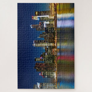 Singapur Skyline bei Nacht mit Licht auf Wasser Puzzle