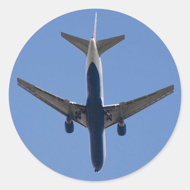 Single-Flugzeug auf blauem Himmel Runder Aufkleber (Vorderseite)