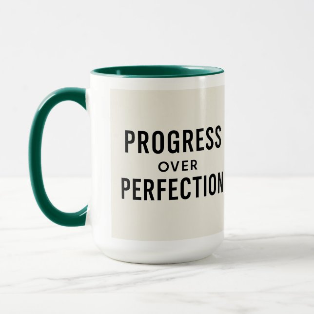 Sip Erfolg: Fortschritt über Perfektion Tasse (Links)