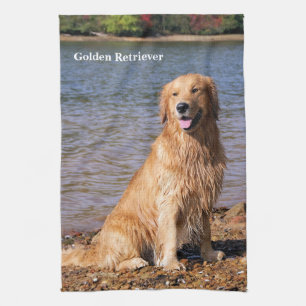 Sitzendes golden retriever geschirrtuch