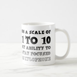 Skala von 1 bis 10 Fokussierter Lustiger Becher Tasse