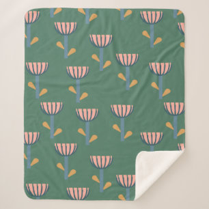 Skandinavisches Folkloremuster im Blumenmuster in Sherpadecke