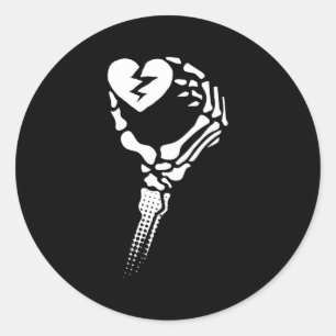 Skeleton Hand Holding Broken He Runder Aufkleber