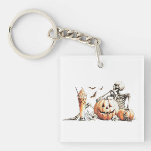 Skelett mit Kürbis und trinken. Halloween. Schlüsselanhänger