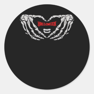 Skeletthandschuhe falten sich in einem Herzen. Fun Runder Aufkleber