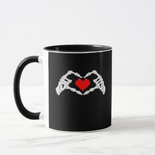 Skelettherz und -handgewähr tasse