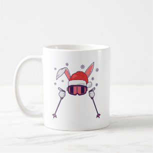 Ski Santa Rabbit mit Weihnachtsmannmütze und Skist Kaffeetasse