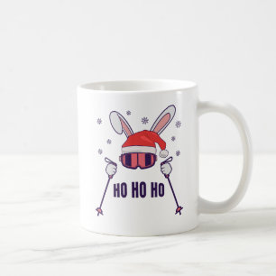 Ski Santa Rabbit mit Weihnachtsmannmütze und Skist Kaffeetasse