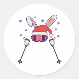 Ski Santa Rabbit mit Weihnachtsmannmütze und Skist Runder Aufkleber