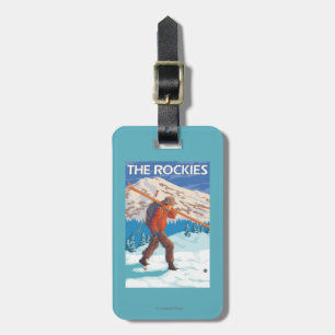 Skifahrer-tragende Schnee-Skis - die Rockies Gepäckanhänger