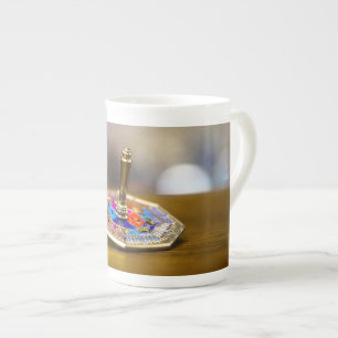 SlipperyJoe Chanukka-Dreidel-Geschenk achteckiger Prozellantasse