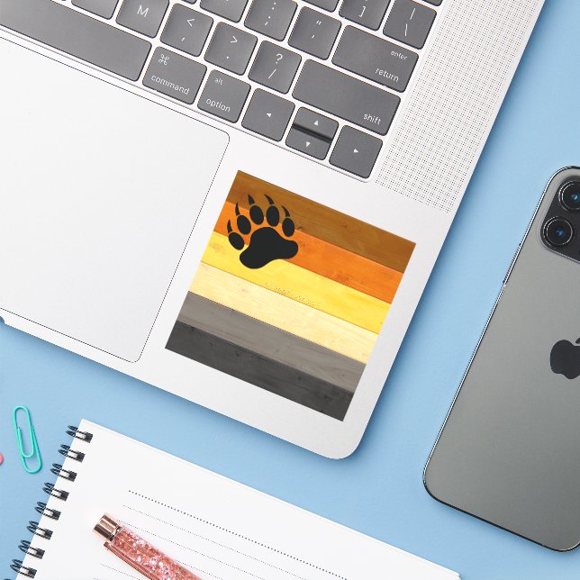 SlipperyJoe's Bärenpride-Fahne Holzbodenstruktur Aufkleber (Laptop mit iPhone)