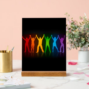 SlipperyJoe's Gruppenmitglieder, die Hände bilden Acrylschild