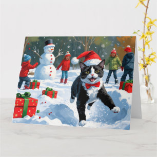 Smoking-Cat läuft im Schnee mit Weihnachtsmütze Karte