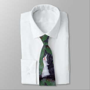 Smokings-Katze, die oben den Schneeflocken, malend Krawatte