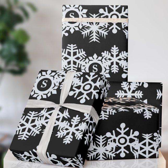 Snowflake Monogram Black Christmas Wrapping Paper Geschenkpapier (A classic black and white snowflake pattern with space for your initial. Happy Holidays!)