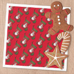 Snowman Christmas Stocking Tiled Pattern Serviette<br><div class="desc">This Christmas holiday napkin design feature a tiled photograph of a red and green stocking with an adorable snowman dressed in a seasonal pläd scarf and hat set over a red background. Click customize to add text in a typeface style, color and size you prefer. Design is also available in...</div>
