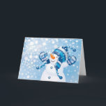 Snowman Feiertagskarte<br><div class="desc">Snowman spielt im Schnee mit blauem Hintergrund</div>
