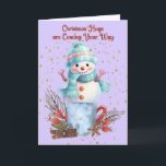Snowman Hugs Weihnachtskarten Karte<br><div class="desc">Snowman umarmt die Weihnachtskarte mit einem niedlichen Schneemann,  der auf einem Container mit Dekorationen stehend ist. Die Wörter auf der Innenseite können geändert werden.</div>