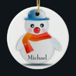 Snowman Ornament<br><div class="desc">Ein fröhlicher und festlicher Schneemann,  der Ihren Urlaub verziert. Anpassen,  indem Sie "Michael" durch einen beliebigen Namen ersetzen. Design erstellt von Black Brook Fotografie mit Grafik von Pixabay September 2014.</div>