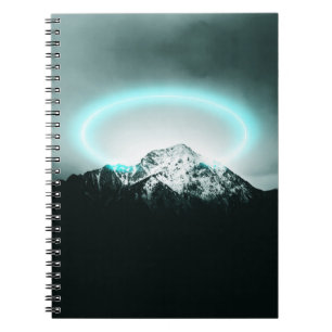 Snowy mountain mysterious blue neon light notizblock