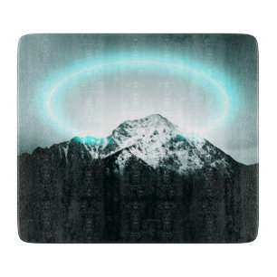 Snowy mountain mysterious blue neon light schneidebrett