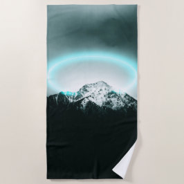 Snowy mountain mysterious blue neon light strandtuch
