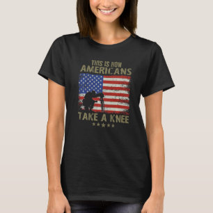 So nehmen Amerikaner ein Knie T-Shirt