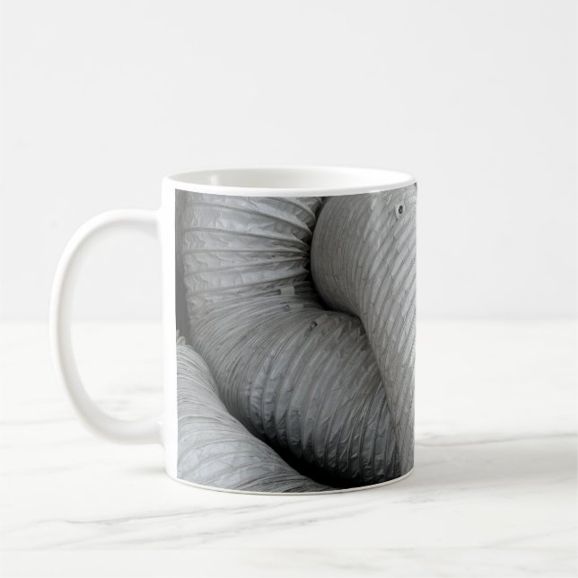 Sofa aus grauem und schwarzem Stoff Kaffeetasse (Links)