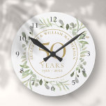 Soft Watercolor Blätter 50 Jahre alt Runde Wanduhr<br><div class="desc">Dieses elegante botanische 50-jährige Hochzeitsstipendesign mit zarten,  sanften Aquarellfarben-Blätter kann mit Ihren speziellen Informationen zum 50-jährigen Jubiläum in edlem Goldtext personalisiert werden. Entwickelt von Thisisnotme©</div>