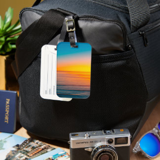 Sonnenaufgang am Strand Gepäckanhänger