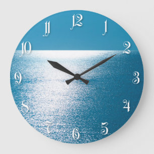 Sonnenaufgang im Ozean Große Wanduhr